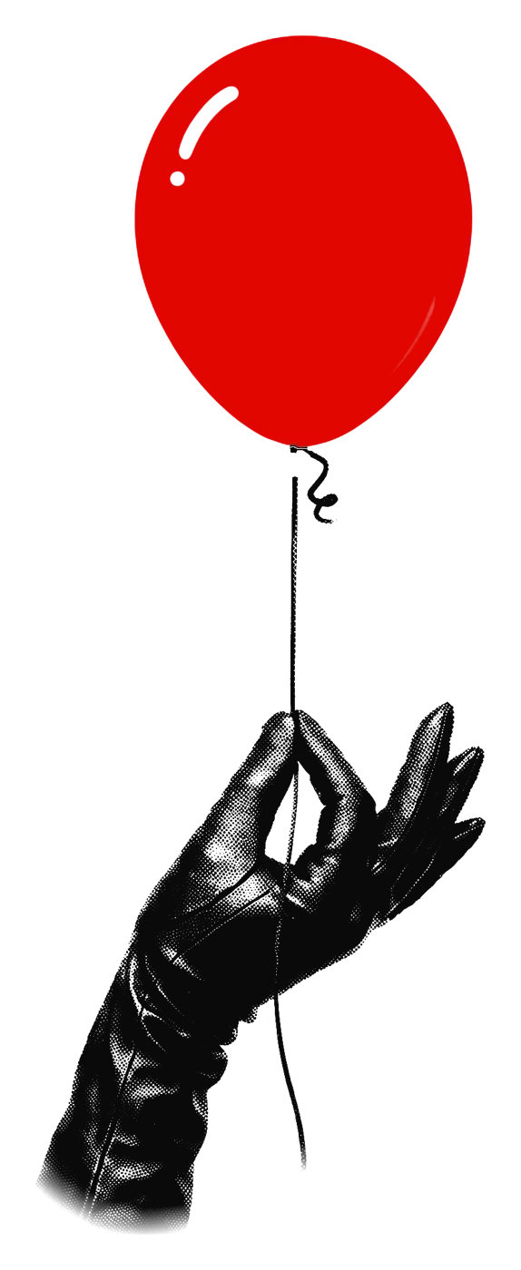 Black gloved hand holding the string of a red balloon