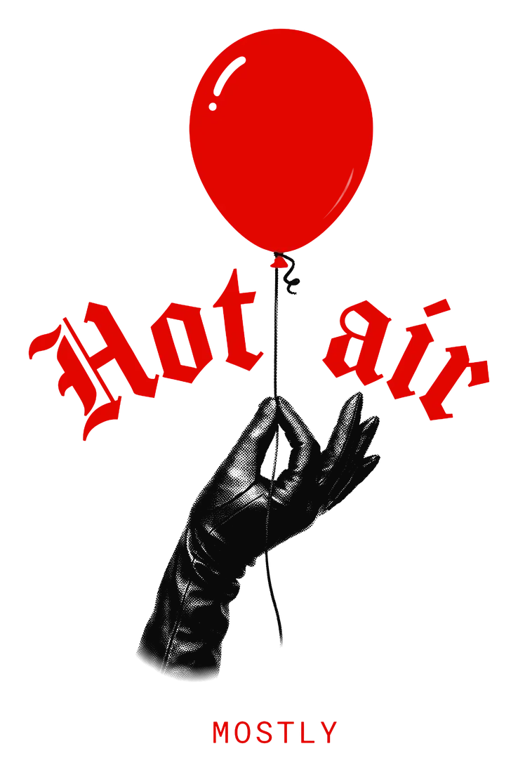 Black gloved hand holding the string of a red balloon